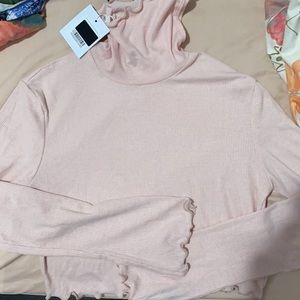 Pink cropped turtleneck